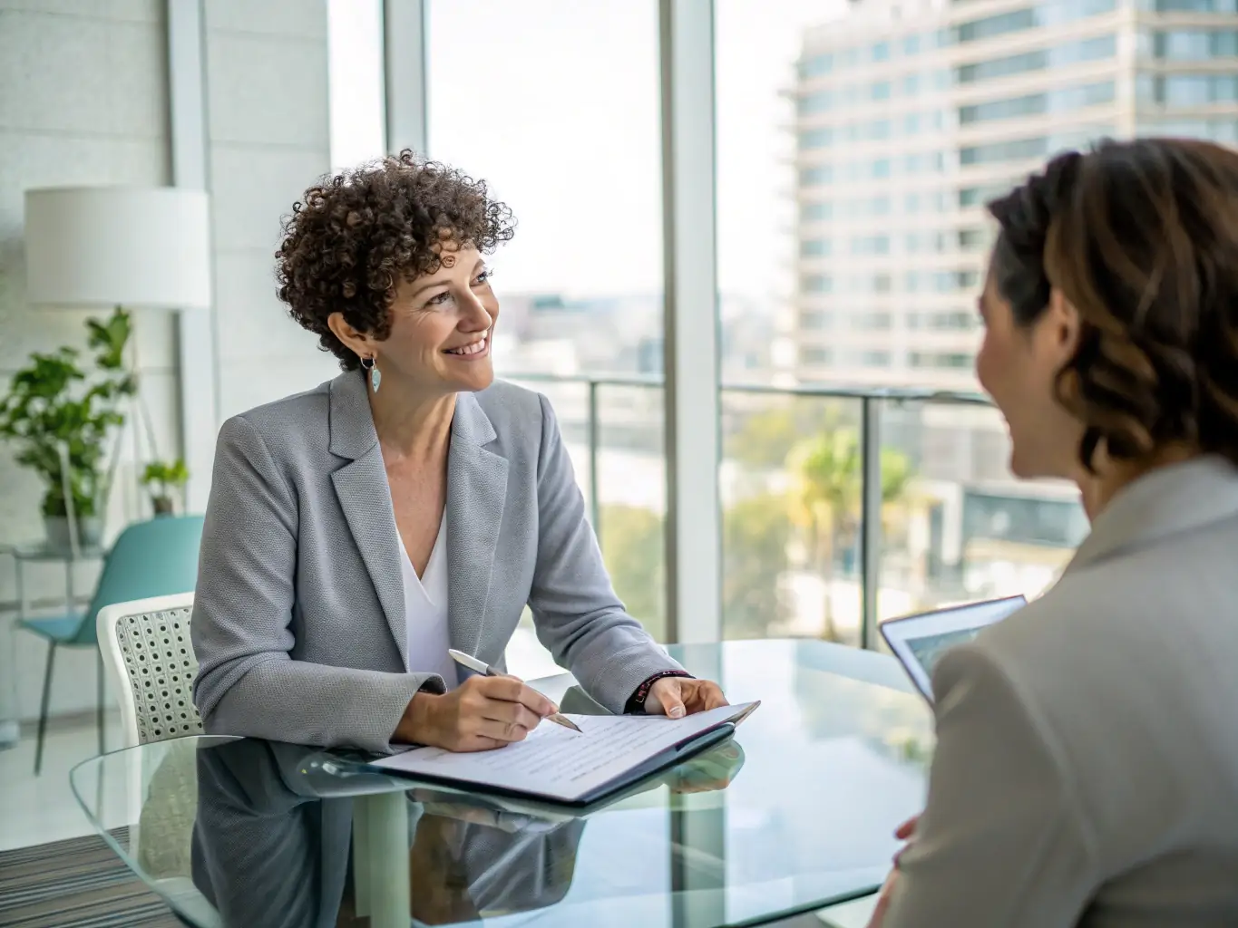 A focused professional receiving career coaching advice in a modern co-working space in Manchester, UK, highlighting career advancement and skill development.